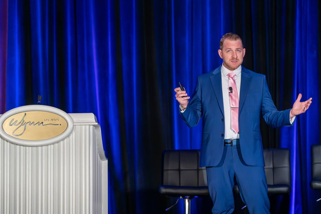 Dr. Jesse Morse speaking on stage